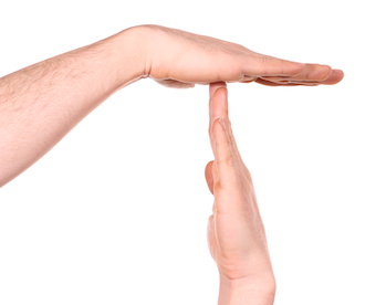 Image of two hands making a time-out sign