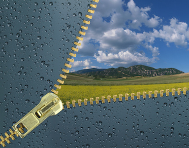 Image of rainy window unzipped to show beautiful sky