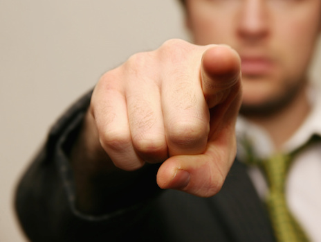 Image of a man pointing an accusing finger