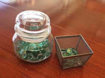 Image of a jar with glass beads inside