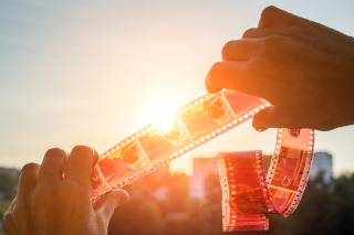 Image of film strip lit up by sunlight