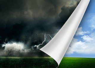 Image of lightning storm over a field, with lower right hand corner turned like a page to reveal blue sky pretty clouds and green field