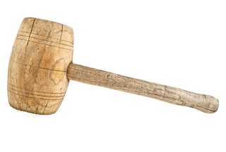 Image of vintage wooden mallet on a white background