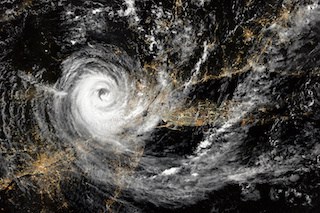 Image of aerial view of hurricane over northeastern United States at night. New York City and Newark, New Jersey. Long Island.