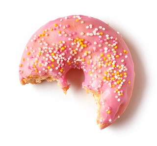 Image of fresh-baked donut with pink icing & sprinkles -- and a big bite taken out of it