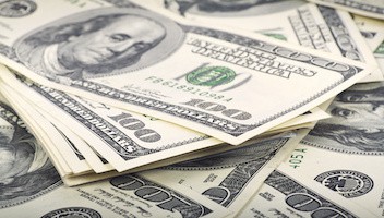 Image of many $100 banknotes on money background