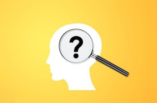 Image of a silhouette of a man's head with a magnifying glass over a large question mark against a sunny yellow background