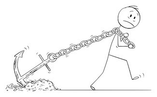 Image of a cartoon stick figure of an unhappy man dragging a big anchor by its thick chain to conceptually illustrate the metaphor of an unresolved life or work problem